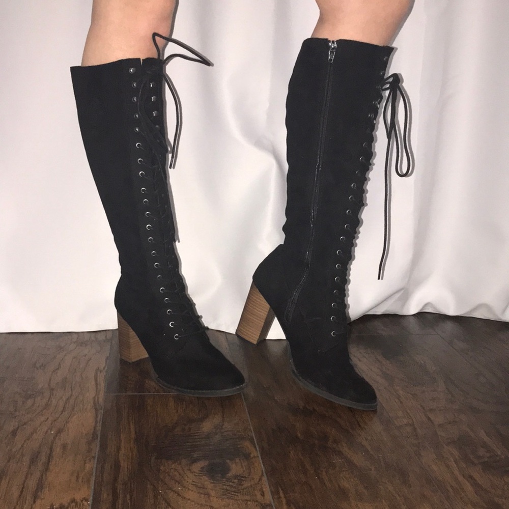 Lace up high heel boots